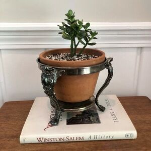 Silver colored vintage chafing stand to use as decor